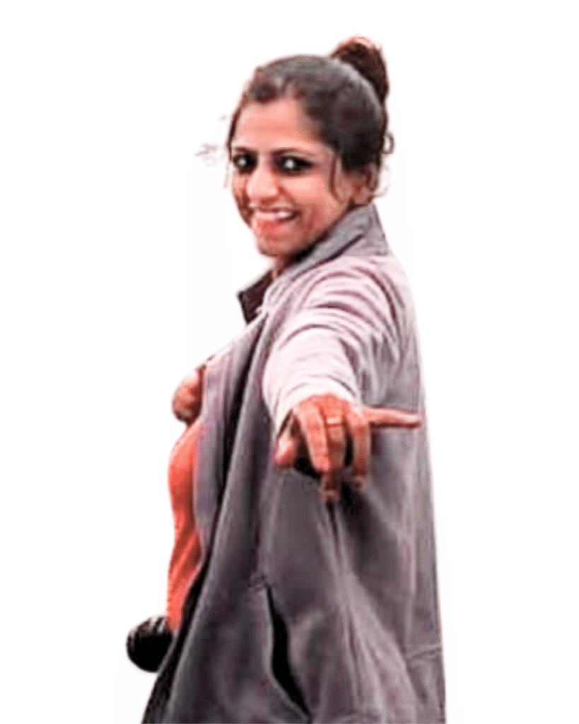 Priyanka Gupta a woman who lives a nomad life - looking and smiling at the camera