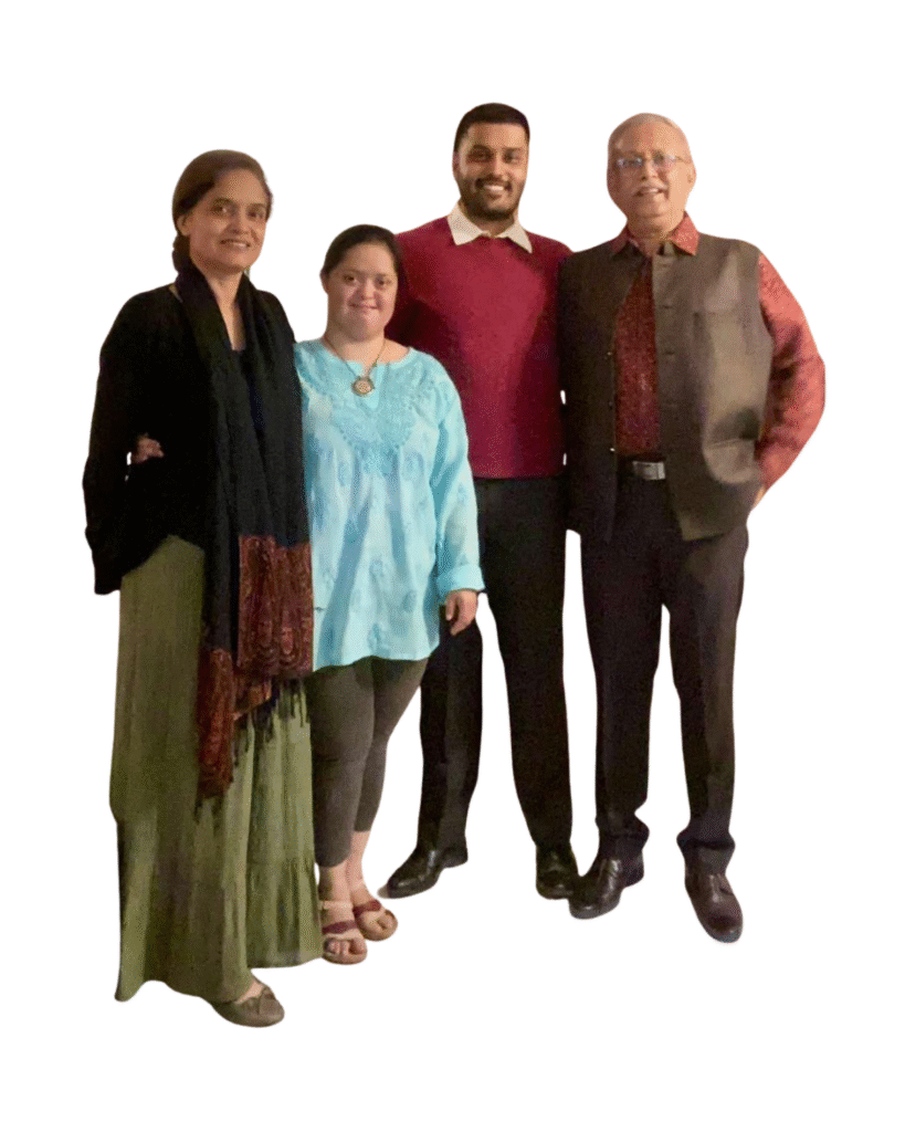 Shivaji and Sonali Indalkar smiling with their daughter who has down syndrome